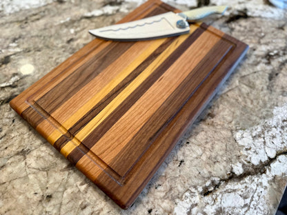 Shedua, Zebra, Yellowheart, and Cherry Wood Cutting Board